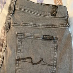 Woman’s gray jeans